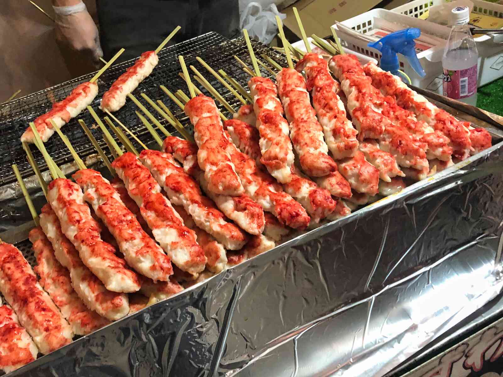 Crab kebabs on the grill in Kyoto Japan.