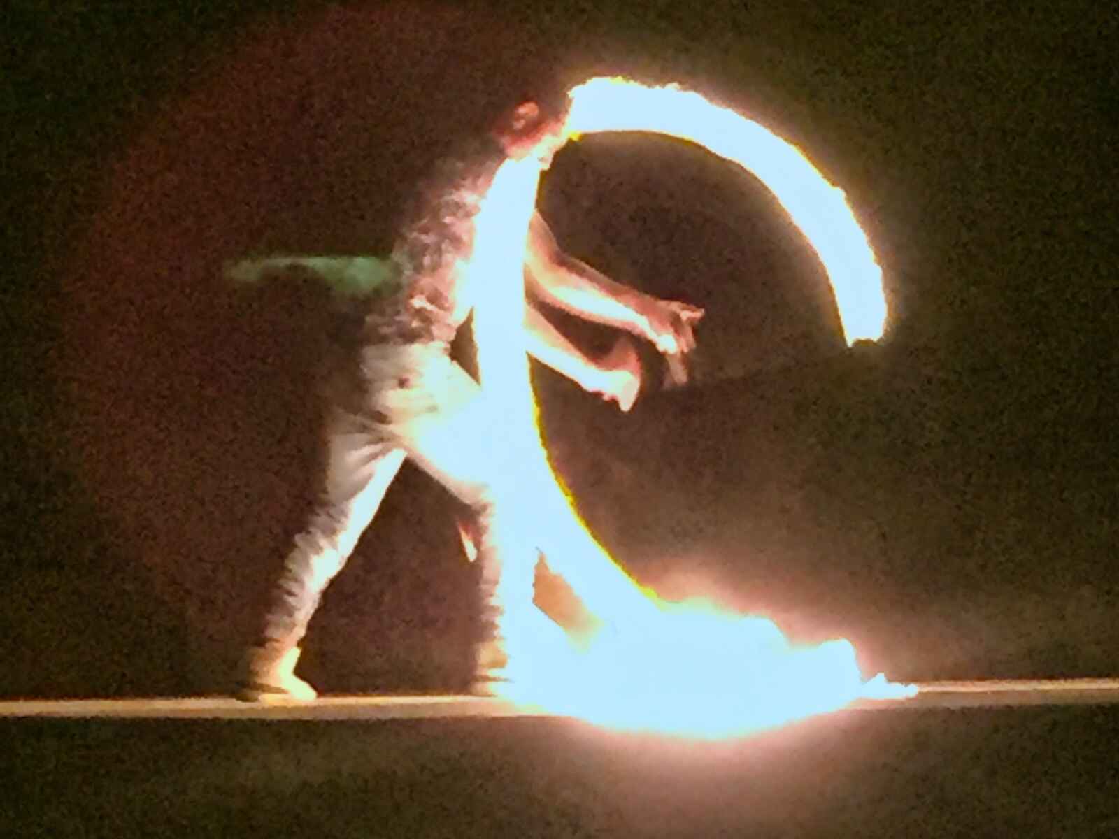 A firedance in a bedouin encampment performing.